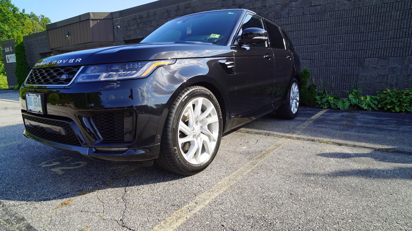 Glossy black Range Rover after ceramic coating at IMS Detailing in Hooksett, NH