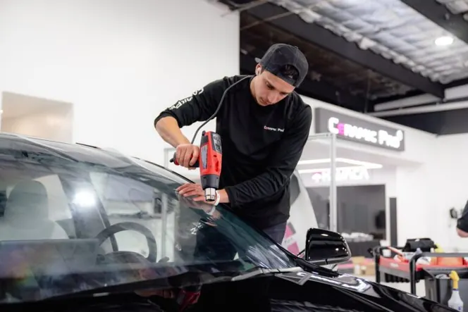 Window film install on a car windshield at IMS Detailing, Hooksett NH