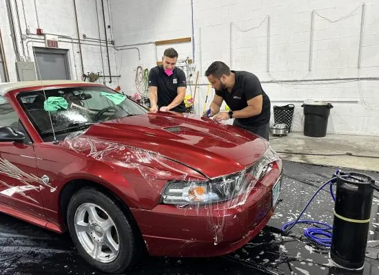 Paint protection film install on a red Mustang at IMS Detailing, Hooksett NH